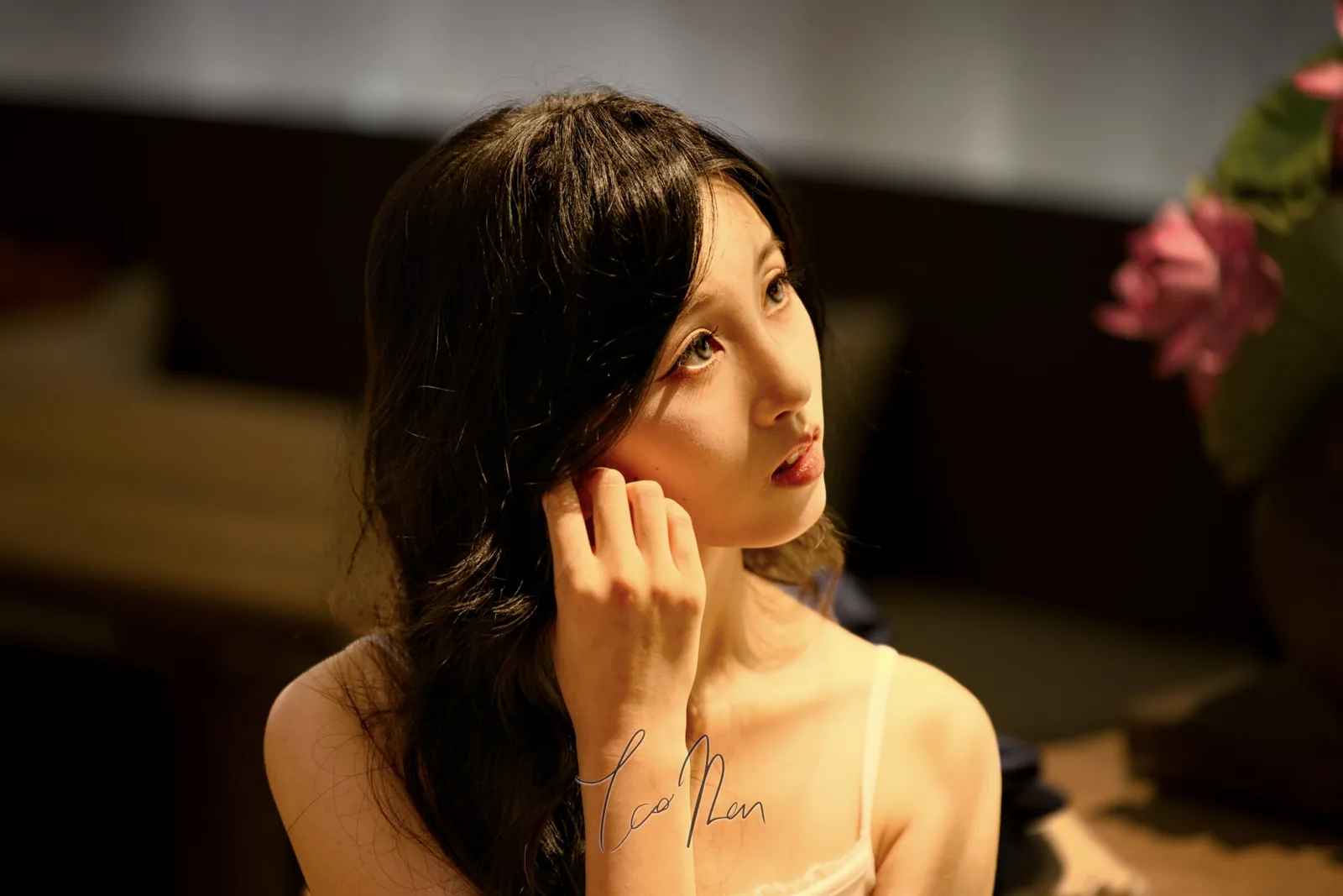 A portrait in warm yellow light
